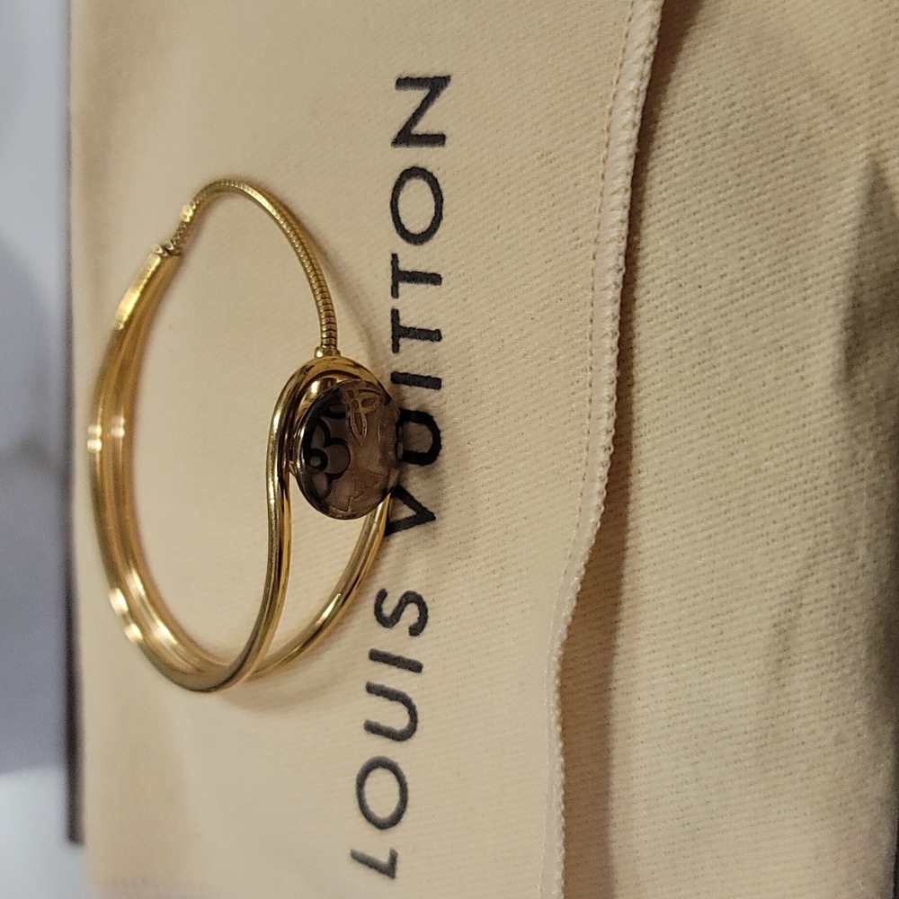 LOUIS VUITTON CELESTE MAGNET GOLD TONE BRACELET - Picture 13 of 16